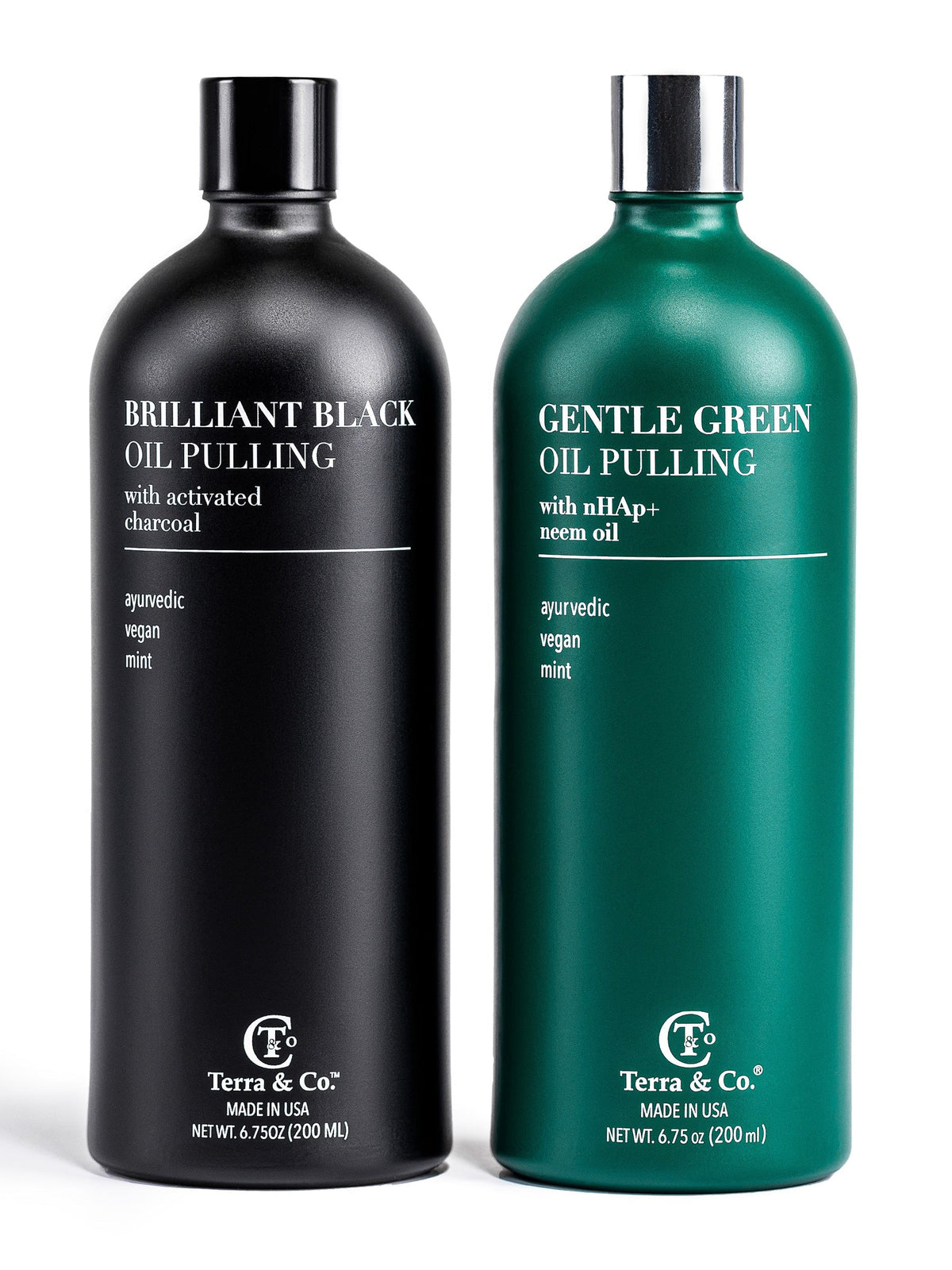 Two bottles of Terra & Co. oil pulling products, one black and one green, on a white background.