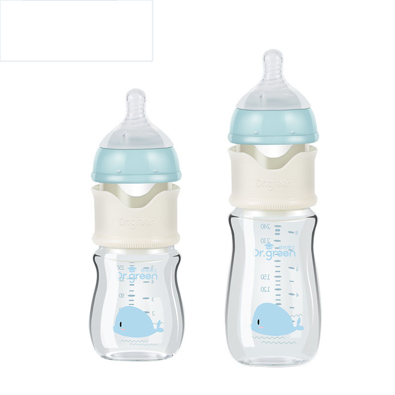 Two baby bottles with blue whale designs on a white background