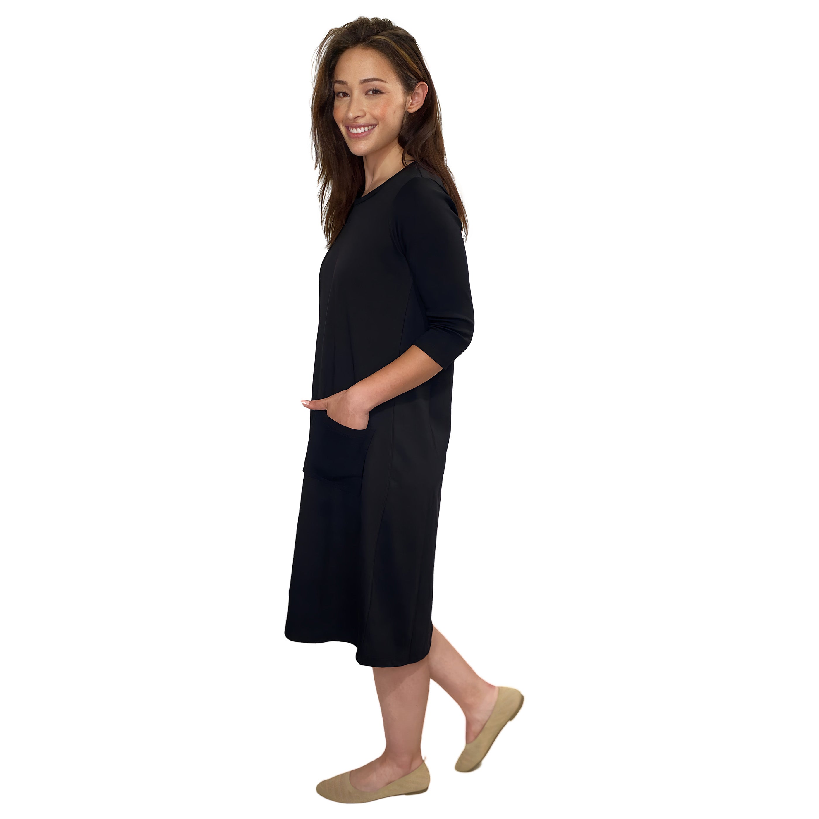Woman wearing a black dress on a white background