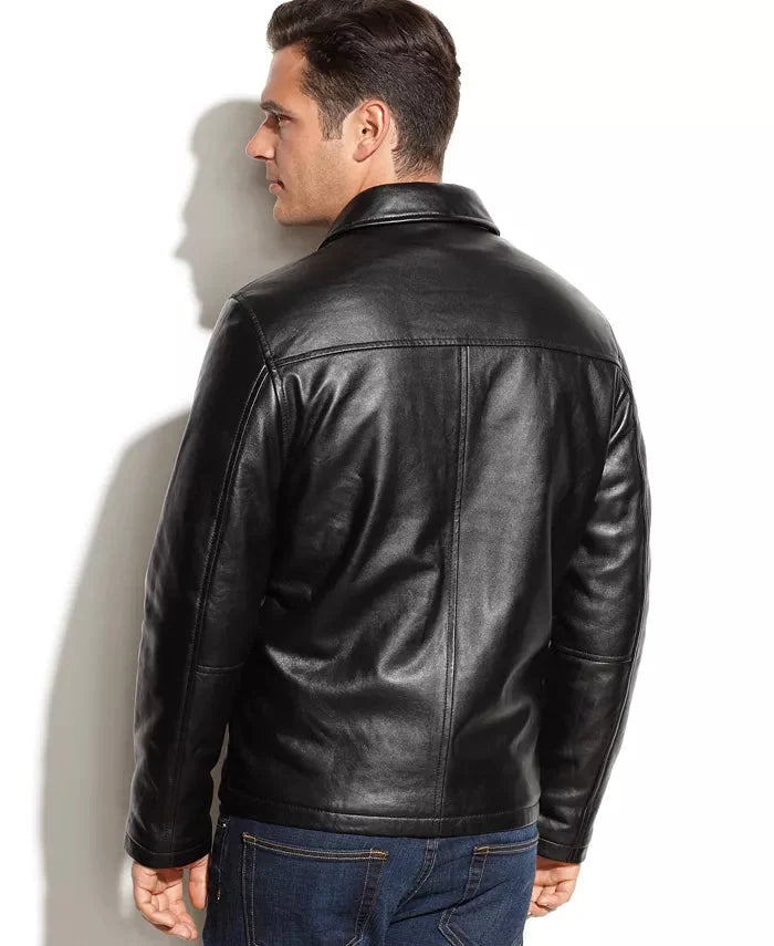 Man wearing a black leather jacket against a white background