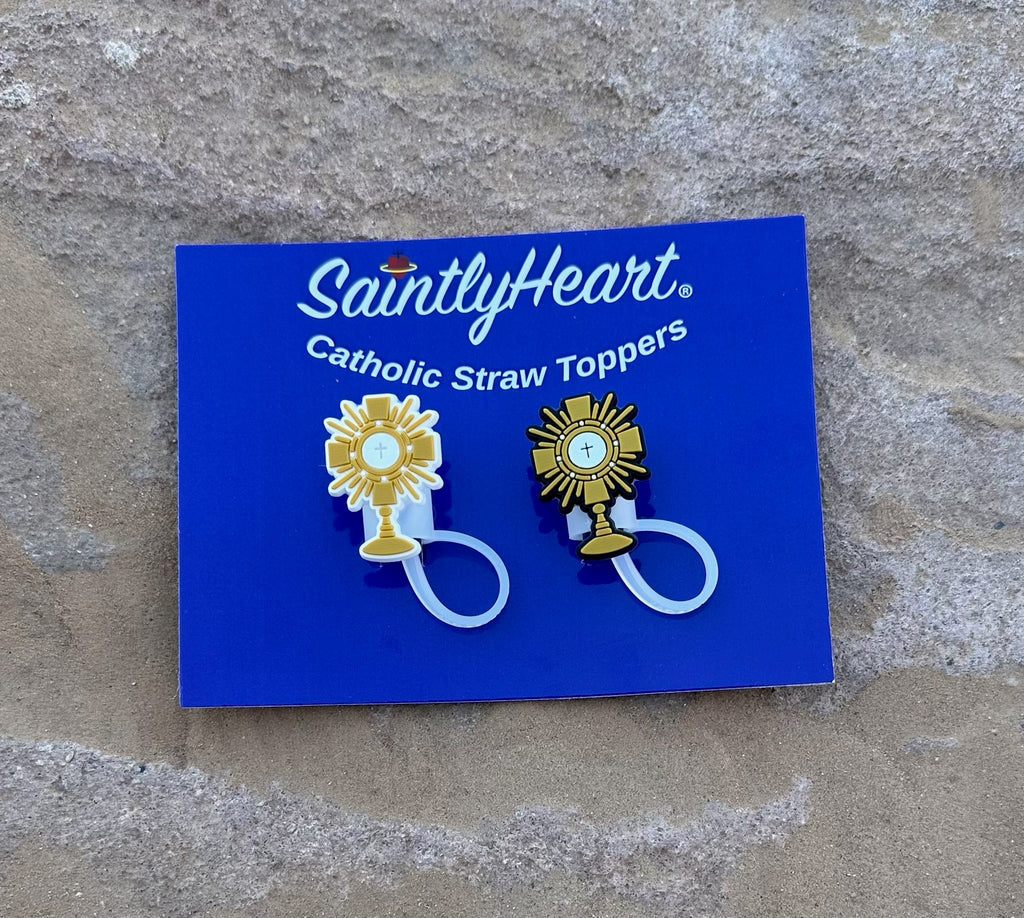 SaintlyHeart Catholic Straw Toppers on a blue card against a stone background