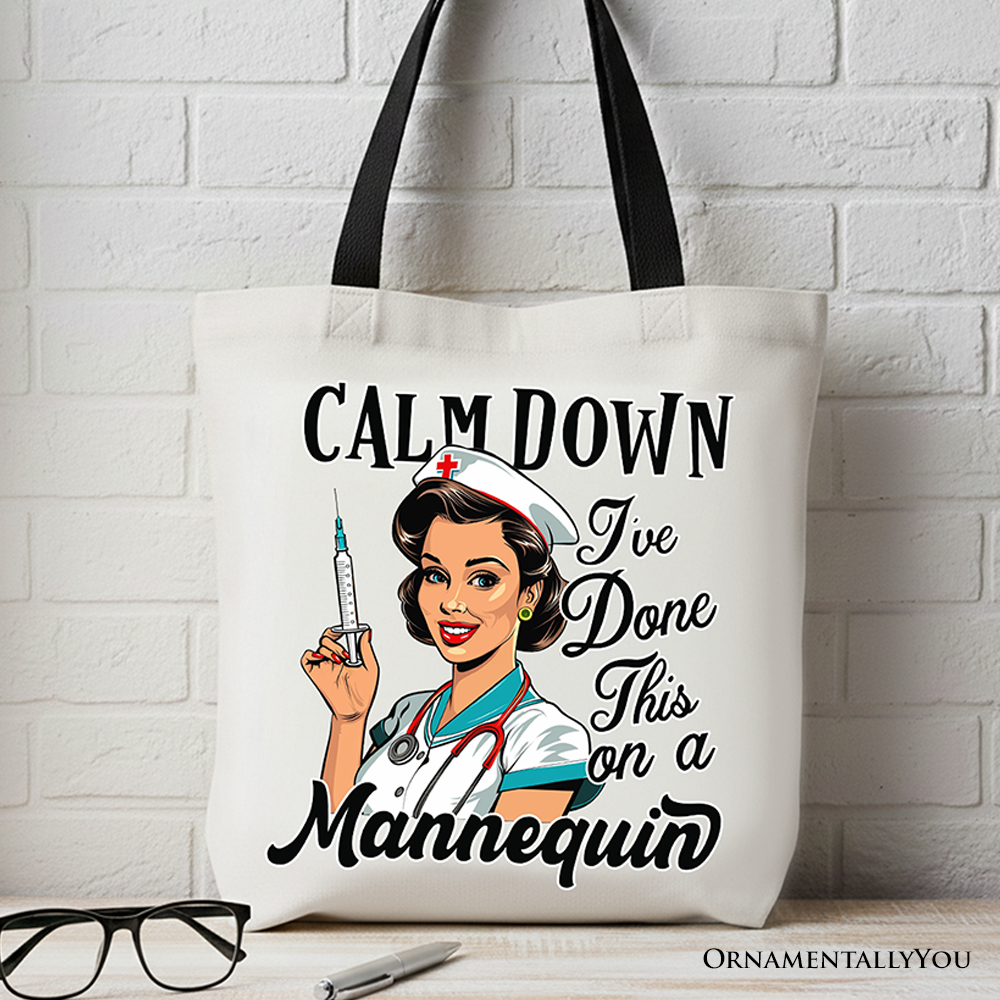 Sassy Nursing School Tote Bag that reads "Calm Down I've Done This on a Mannequin" — funny nurse gift, canvas shopper, made in USA. Curated with love by bigheartsdobigthings2.com 💚
