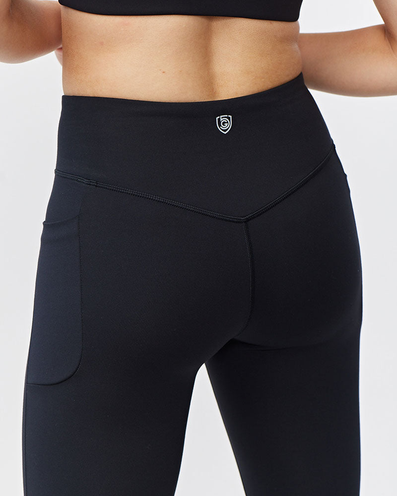 Black leggings with a brand logo on a white background