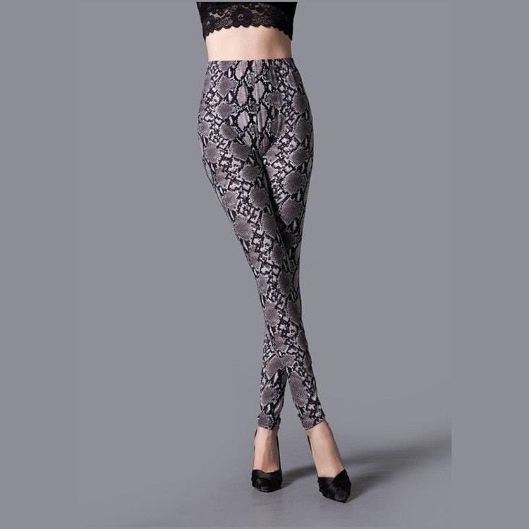 Patterned leggings worn by a person on a gray background
