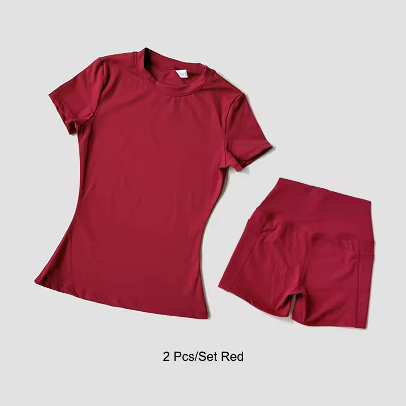 Red t-shirt and shorts set on a light gray background