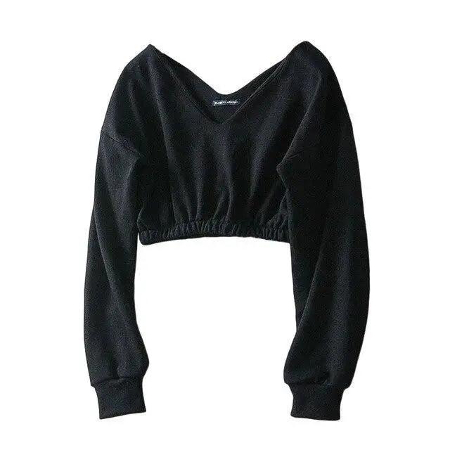 Black long sleeve crop top on white background.